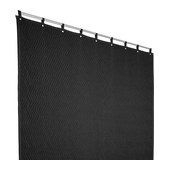 A moving blanket hung from a rod by grommets